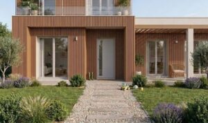 Entrée de maison avec allée et bardage bois